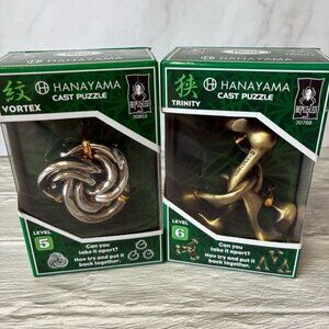 NIB Hanayama Cast Metal Brain Teaser Puzzles Vortex & Trinity Set of 2
